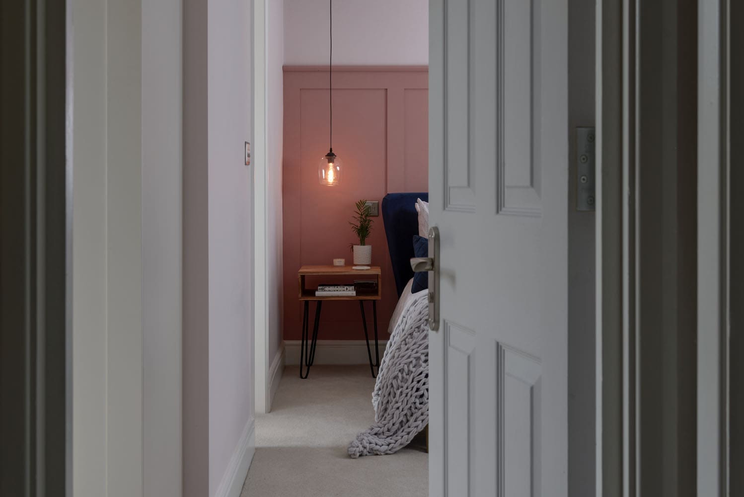 view of loft conversion bedroom from behind the door