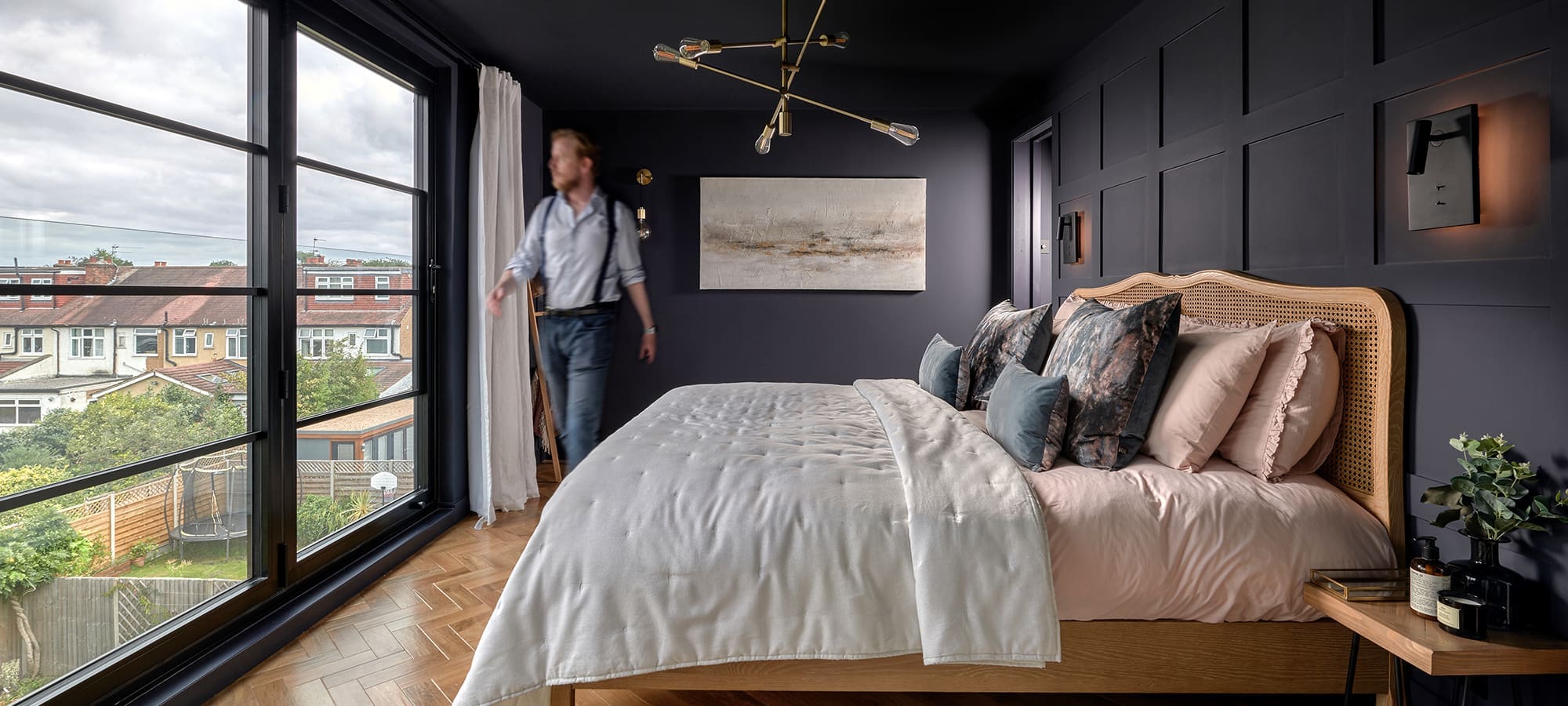Loft Conversion Company spacious master bedroom in double hip to gable rear dormer loft conversion